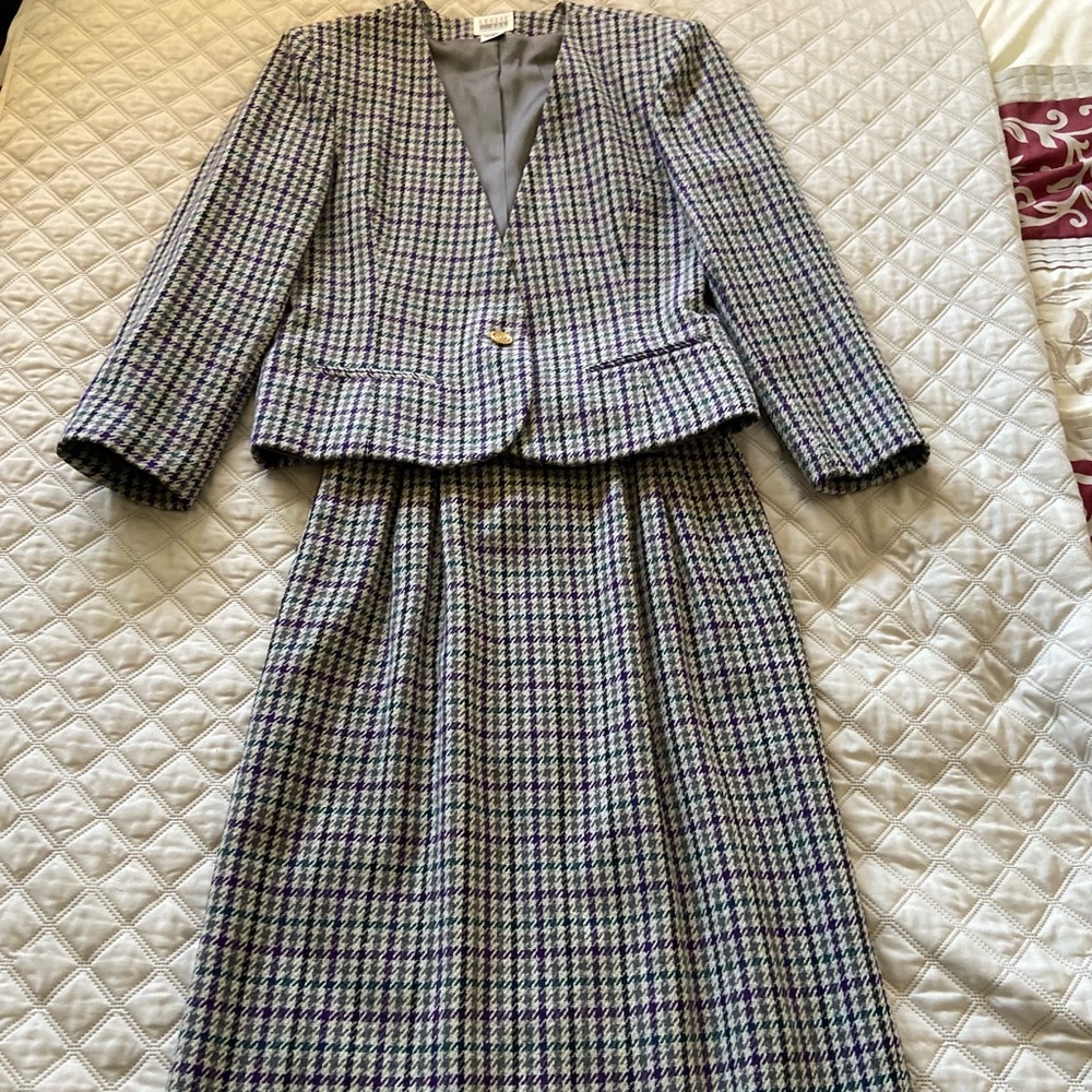 Beautiful teal, gray, purple suit. Fully lined.  Excellent condition.